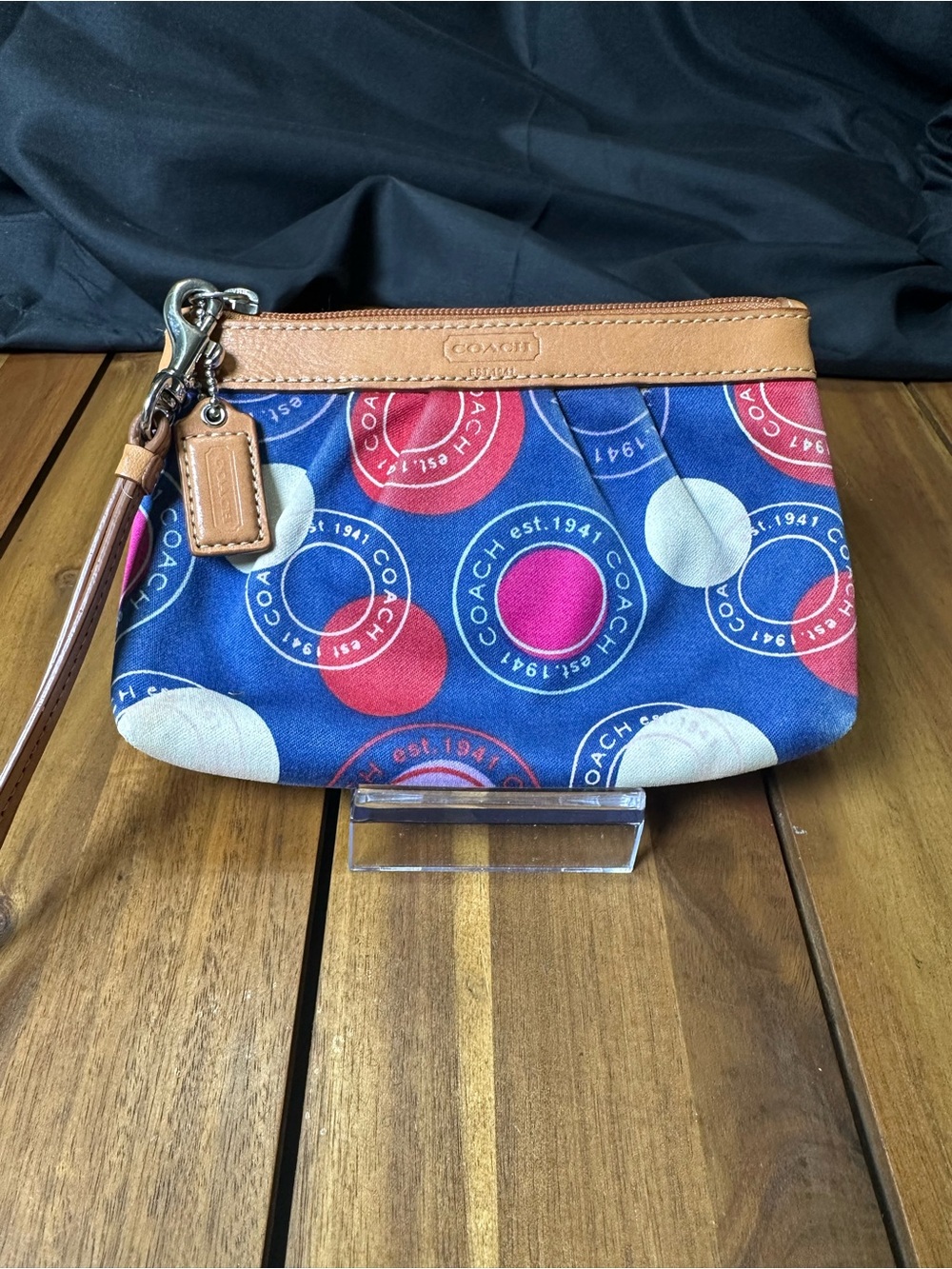 Coach Blue Circle Pattern Wristlet with brown leather trim